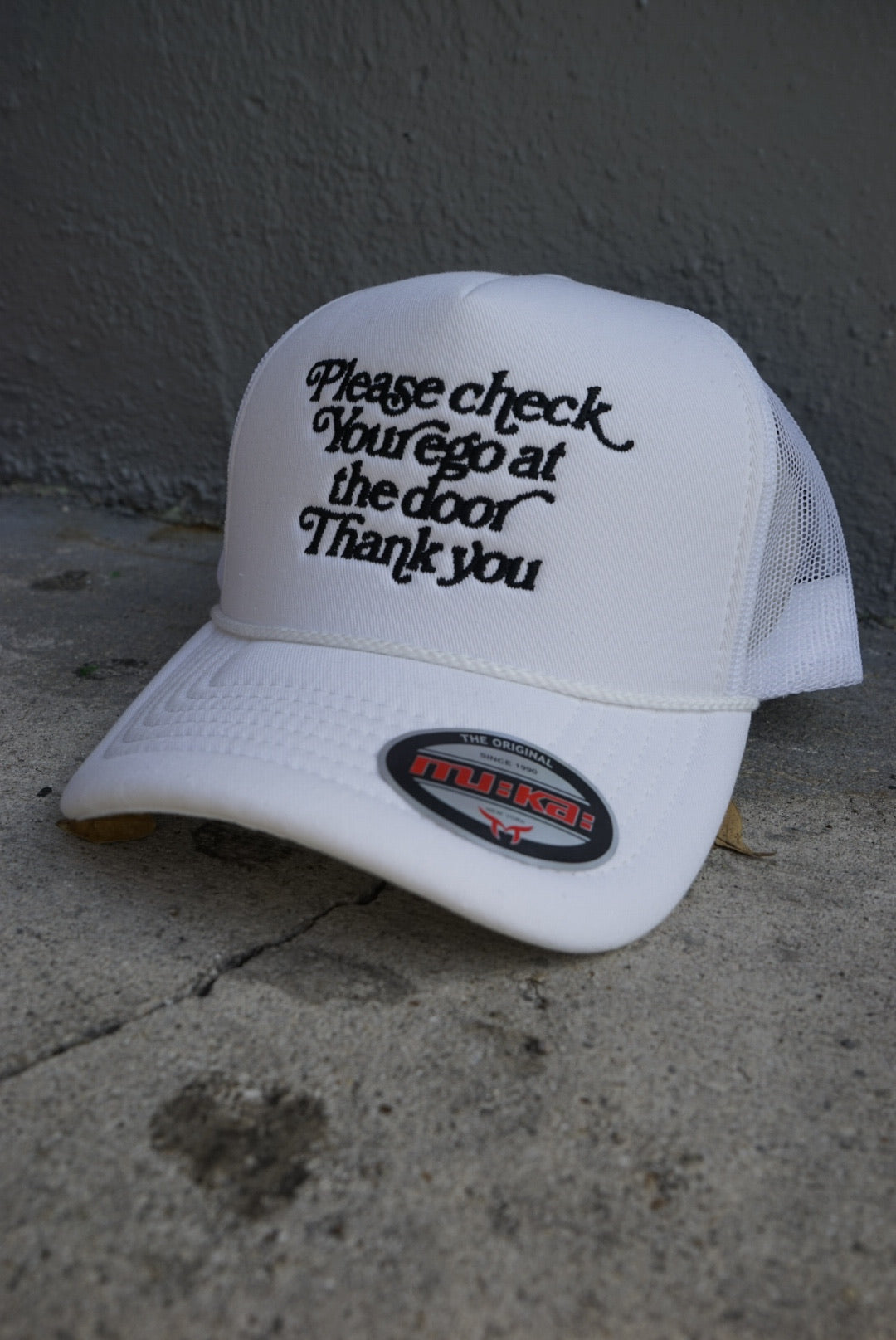 Please Check Your Ego At The Door Trucker Hat