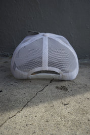 Please Check Your Ego At The Door Trucker Hat